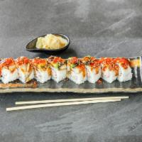 Dragon Roll · Eight pieces. Shrimp tempura, crab salad, and cucumber. Topped with avocado, unagi, and masa...