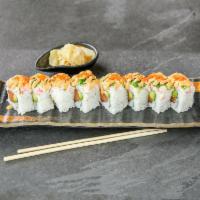 Ocean Beauty Roll · Eight pieces, Salmon and avocado. Topped with crab salad, seaweed salad, and masago (fish roe)