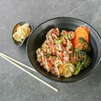 Chicken Karaage Don · Japanese fried chicken, fried egg, and vegetables over rice