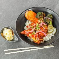 Salmon Teriyaki · Crispy battered salmon filets, fried egg, and vegetables over rice
