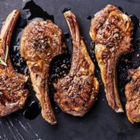 Four Lamb Chops Plate · Lamb chops grilled and served with served with rice, salad, pita bread and sauce