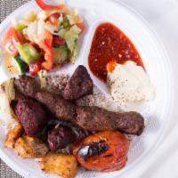 Mix Grill Plate · Skewer of kufta, chicken & shish kabob with grilled tomato & onion served with rice