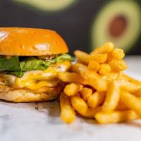 Avocado Burger · Grilled chicken or beef, cheese, lettuce, tomatoes, pickle and avocado sauce.