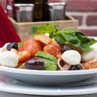 Caprese Salad · Fresh mozzarella, red ripe tomatoes, fresh basil, olive oil. 