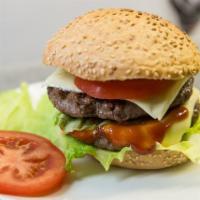 Hamburger · Served with lettuce, tomatoes, and onions.
