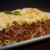 Baked Lasagna · Pasta layered with ricotta, mozzarella, meat, tomato sauce and Romano. 