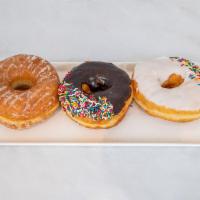 Donut  · Glazed, Chocolate or Vanilla 