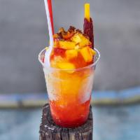 Mangonada · Shaved ice, natural mango syrup, chamoy, mango chunks, tajin, and tamarind straw.
