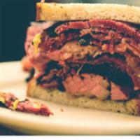 Pastrami Overdose Sandwich · Fresh and juicy pastrami with lettuce, tomato, onion and mustard.