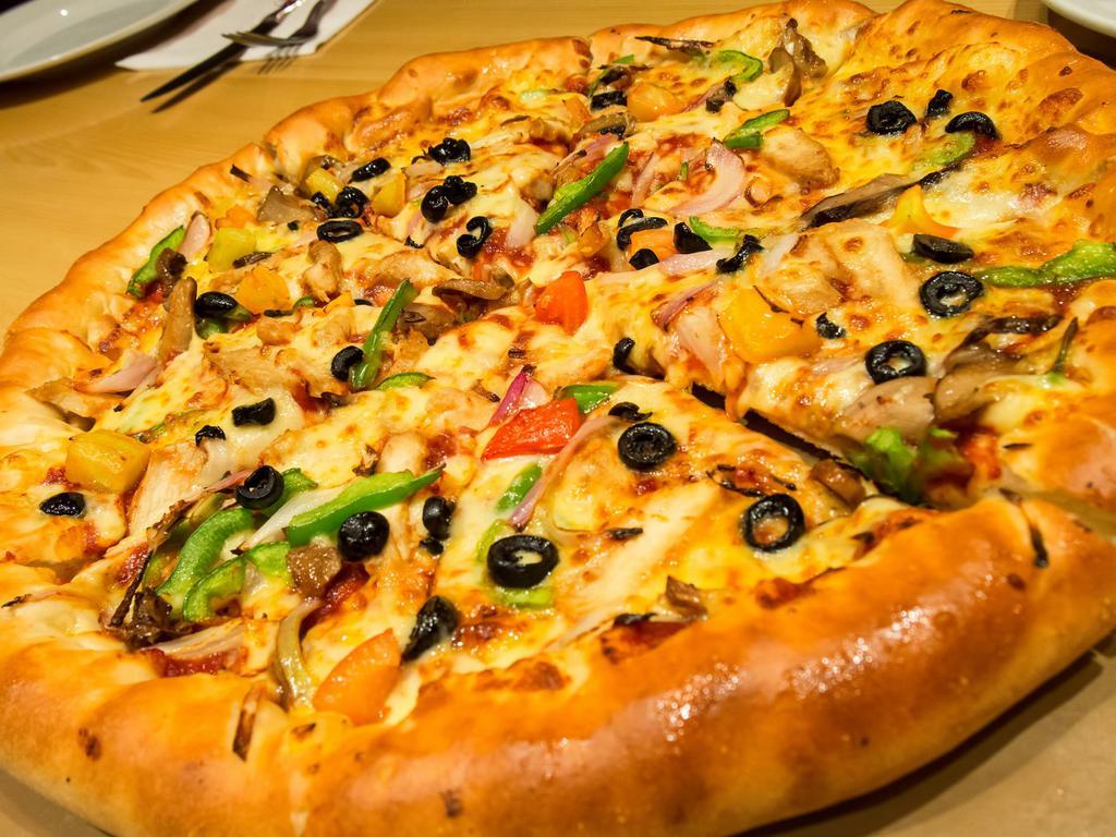 Chicken Supreme · Tomato sauce, kosher mozzarella, halal chicken, mushrooms, banana peppers, roasted red peppers, red onions, green peppers, garlic, black olives. Halal