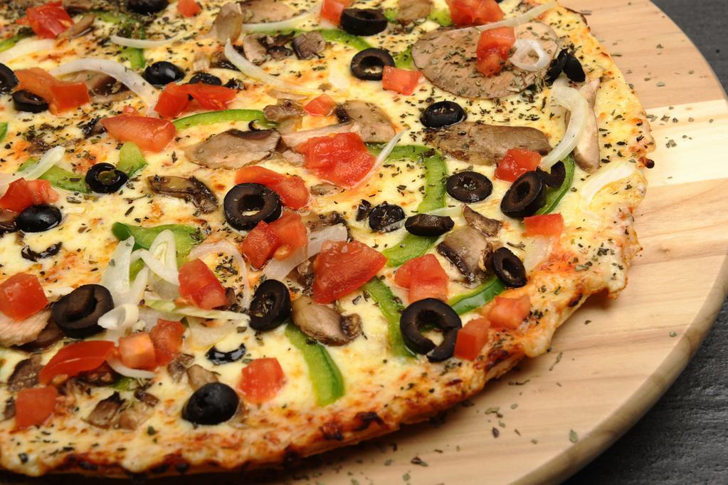 Vegan Veggie · Tomato sauce, vegan cheese, spinach, mushrooms, banana peppers, roasted red peppers, red onions, green peppers, garlic, black olives. Vegan. Halal.