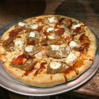 Eggplant Rollatine Pizza · Freshly made eggplant topped with our grande ricotta and our homemade tomato sauce.