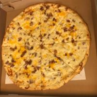 Potato Skin Pizza · Homemade mashed potatoes, cheddar and mozzarella cheese topped with bacon.