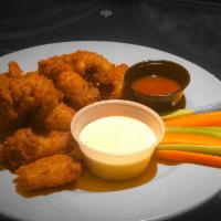 9 Buffalo Wings · Per order. Served with side of bleu cheese dressing and spicy hot sauce or BBQ sauce.