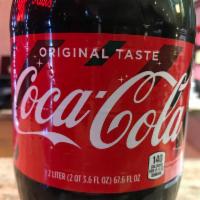 2-Liter Soda · Coke, Diet Coke, Sprite, Mnt Dew, Orange, Pineapple, Grape, Pepsi, Dr Pepper