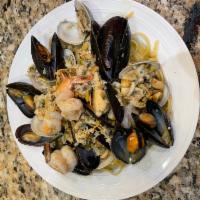 Seafood Linguine · An old Italian favorite, sauteed shrimp, cultured mussels and clams in a classic marinara sa...