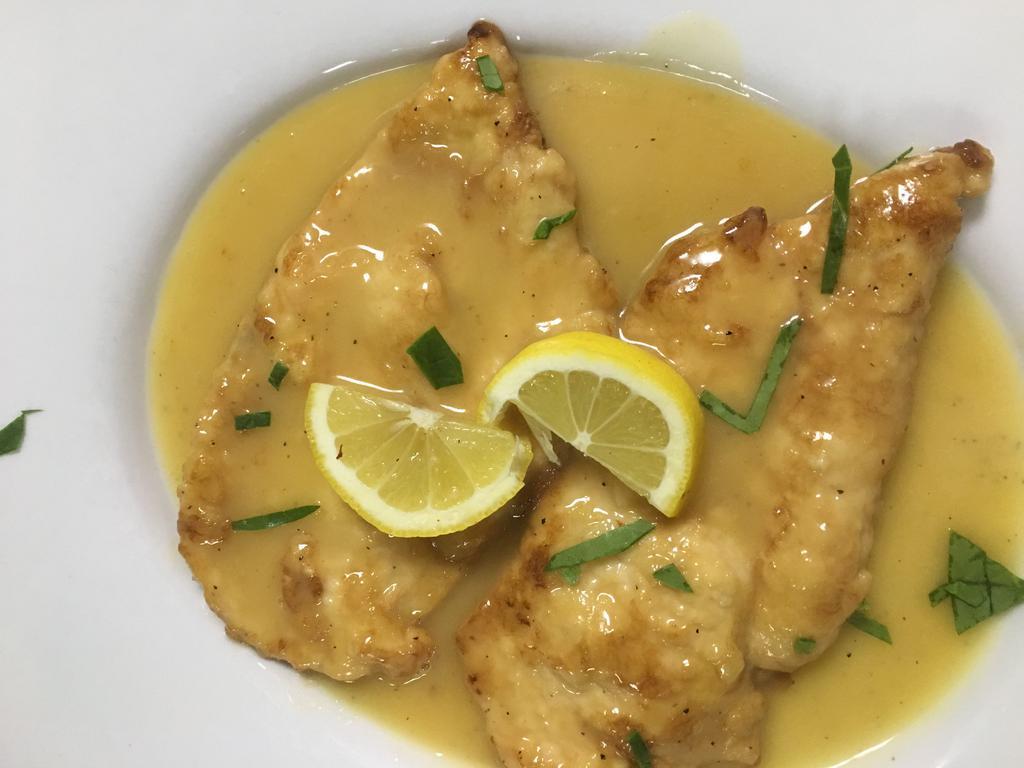 Chicken Francese · Battered breast of chicken sauteed in lemon, butter and white wine.