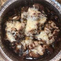 Toskana Shrimp · Battered shrimp in a Marsala sauce topped with mushrooms and melted mozzarella cheese.