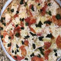 Sofia Loren Thin Crust Pie · Fresh mozzarella, fresh tomatoes, garlic and extra virgin olive oil.