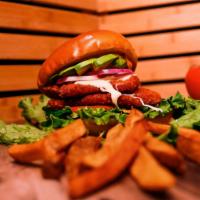 CTown Sandwich · Breaded chicken, lettuce, tomato, raw onion, Oaxaca cheese, avocado, and chipotle mayo on br...