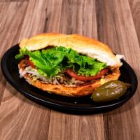 Torta · Mexican styled sandwich with your choice of meat, served on toasted bread with mayo, refried...