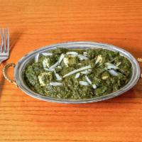 Palak Paneer · Paneer in a thick paste made form pureed spinach.
