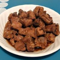 Spareribs Tips with Black Bean Sauce · Served with white rice.