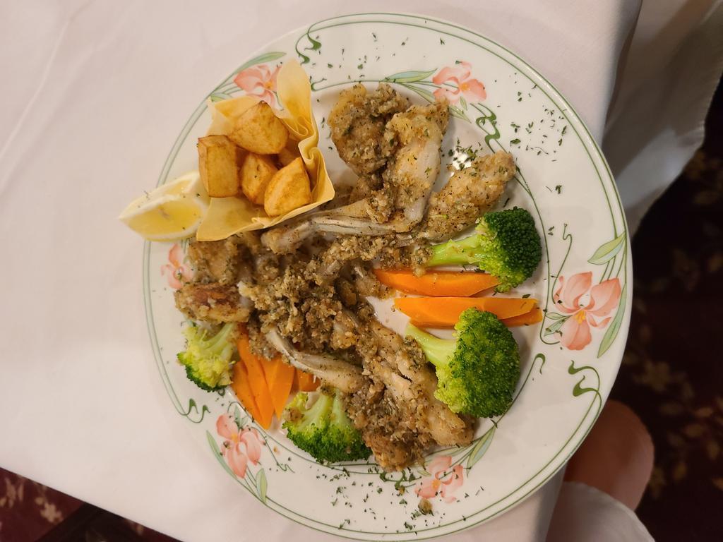 Cuisses de Grenouille · Sauteed frog legs with garlic and parsley.