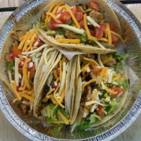 Shredded chicken  Tacos · 3 tacos (shredded)chicken /Cheese /pico de Gallo Served with onion rings, french fries or fr...