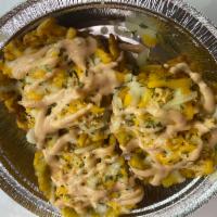 Mofonguitos  · 3 mini mofongos filled with shredded chicken ,shredded cheese topped with famous house sauce 