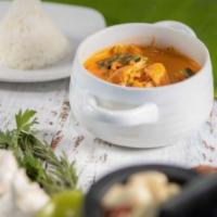 Red Curry · Red chili paste curry in coconut milk with bamboo shoots, carrots, bell peppers and fresh Th...