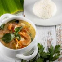 Green Curry · Green chili paste in coconut milk with carrots, eggplant, bell peppers, bamboo shoots and fr...