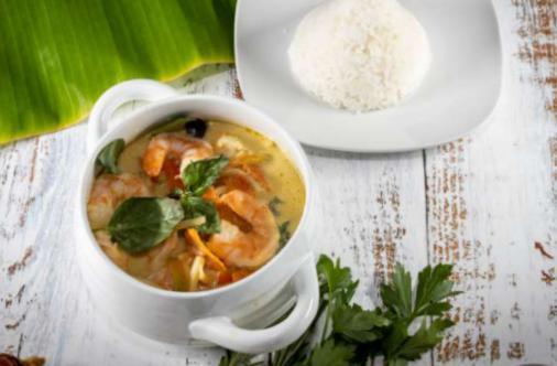 Green Curry · Green chili paste in coconut milk with carrots, eggplant, bell peppers, bamboo shoots and fresh Thai basil.