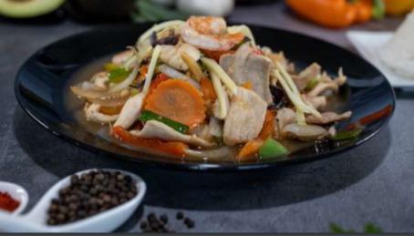 Ginger · Sautéed fresh gingers, onions, bell peppers, carrots, mushrooms and black mushrooms in a light ginger sauce.