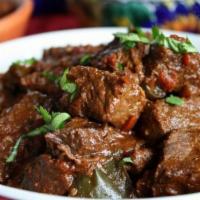 Carne Guisada · Beef stew.