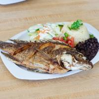 9. Pescado Frito · Tilapia. Servido con arroz, frijoles, pico de gallo y tortilla. Fried tilapia fish. Served w...
