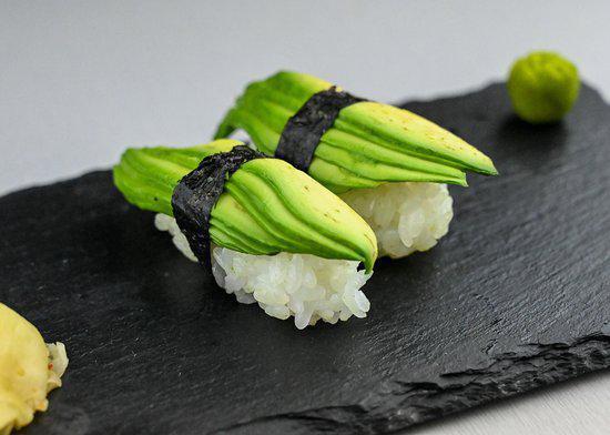 NS8. Avocado Nigiri (2) · Sushi laid top of rice and avocado.