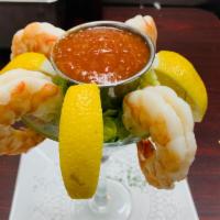 Jumbo Shrimp Cocktail · Jumbo shrimp chilled over ice with a spicy cocktail sauce