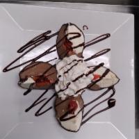 Tartufo · Italian Ice-Cream of Chocolate and Vanilla with a Cherry and Almond Center Covered in a Dark...