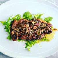 Rosemary Buttered New York Steak · Grilled, tender, juicy, sweet and salty, New York steak topped with a woodsy flavored rosema...