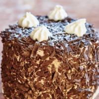 Merveilleux Cake · Meringue mounted with Dark Belgian chocolate whipped cream and coated with Dark Belgian Choc...