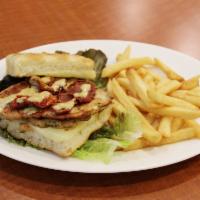 California Club Sandwich · Grilled marinated chicken breast with sun-dried tomatoes, mozzarella and honey mustard sauce...