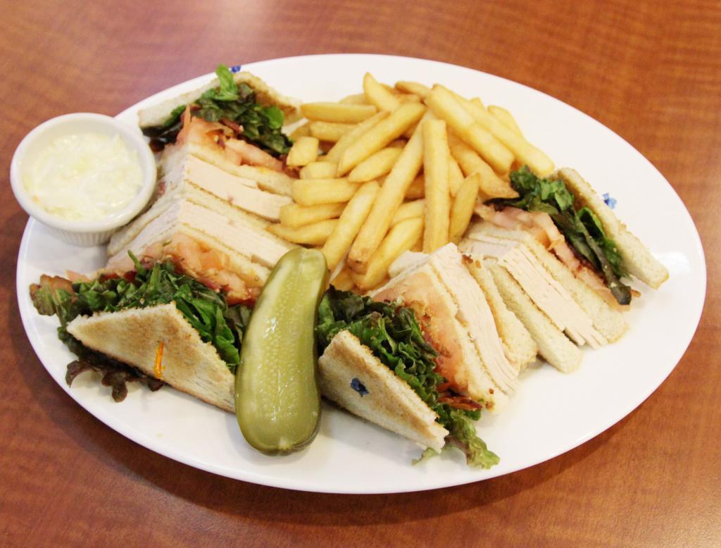 1. Club Sandwich · Turkey and bacon served with lettuce, tomato, coleslaw and french fries.