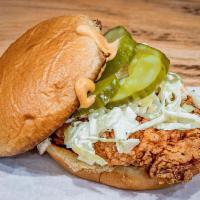 'MOTHER CLUCKER' FRIED CHICKEN SANDWICH · CRISPY FRIED CHICKEN, SLAW, COMEBACK SAUCE, PICKLES, TOASTED BUN, SHOESTRING FRIES
