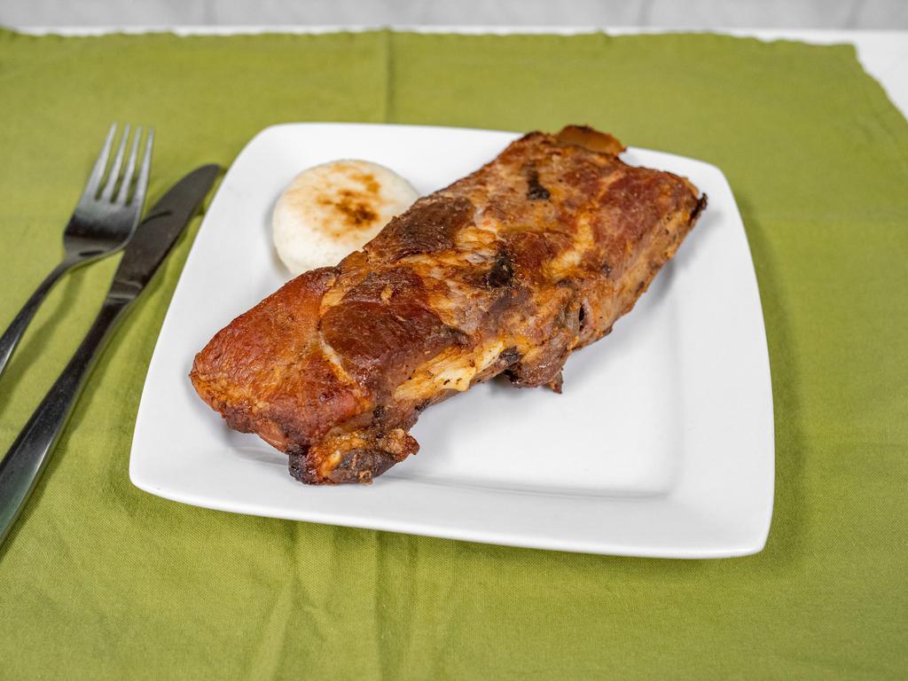 Costilla de Cerdo · Pork ribs.