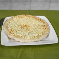 Arepa con Queso · Corn cake with cheese.