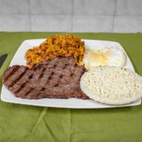 Desayuno Antioquena · Mixed rice and beans, steak, fried eggs, and corn cake with cheese.