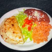  7. Two Piece Quesadillas Lunch  · Pollo, carne o frijoles. 2 pieces quesadillas chicken, beef or beans.