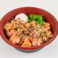 Heights Poké Bowl · Ahi tuna and salmon with house ponzu sauce, and sesame oil. Mixed in with masago, sunomono, ...