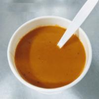 Tomato Bisque · Grilled cheese's best mate, and vegan! Tomatoes, veg stock, aromatics, herbs, spices, and co...